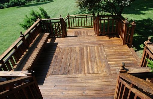 Large wood patio and outdoor landscaping from Dark Horse Landscaping in Boca Raton florida